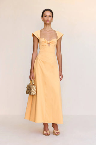 cult gaia yellow dress KYMIA KNIT This Cult Gaia Celestina dress features a striking cowl neck and sleeveless design WREN DRESS - GOLD